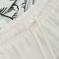 Pantaloni a palazzo con coulisse e parte inferiore floreale IMPERIAL