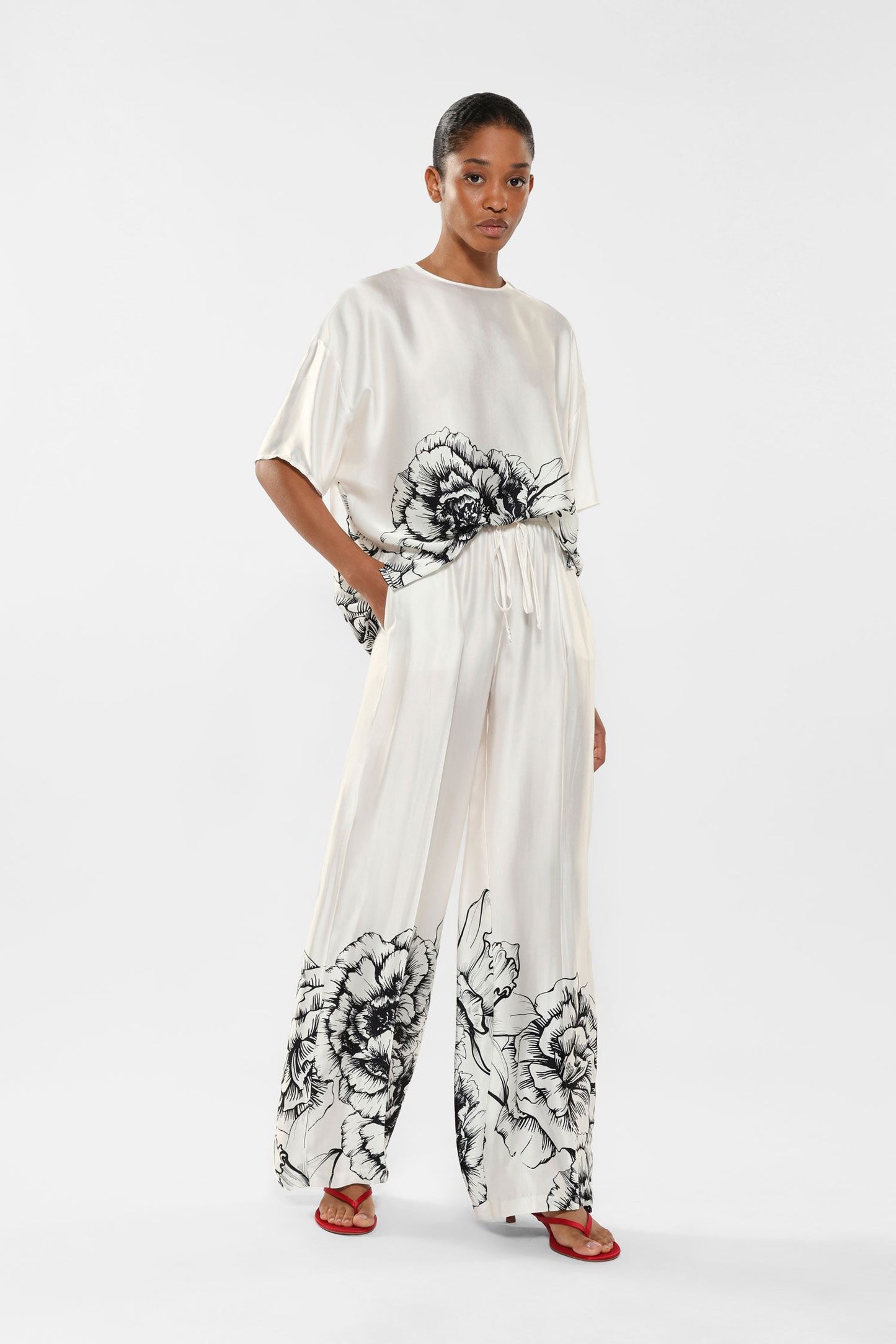 Pantaloni a palazzo con coulisse e parte inferiore floreale IMPERIAL